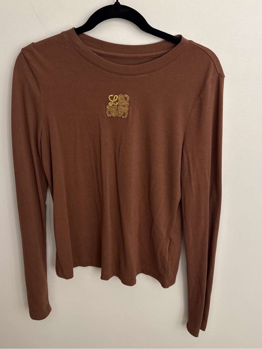 Women’s Brown Long Sleeve Crewneck Top with Gold Emblem